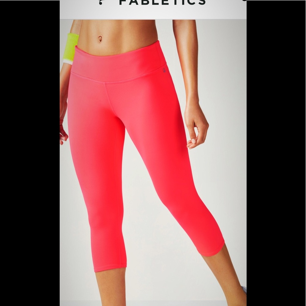NWOT fabletics Tangerine Capris size Xs